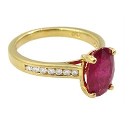 18ct gold oval ruby ring, with round brilliant cut diamond shoulders, hallmarked, ruby approx 2.35 carat
