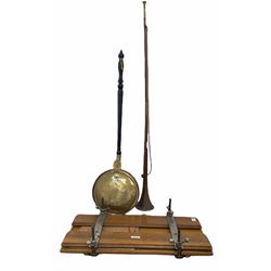 Copper and brass hunting horn, together with a trouser press and a Victorian bed warming pan 