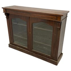 Victorian rosewood side cabinet, rectangular top over two arch glazed doors, the uprights with acanthus carved S-scroll brackets, on plinth base