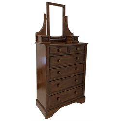 Willis & Gambier - mirror backed chest, the adjustable mirror over two trinket drawers and two short and four long graduated drawers, raised on bracket supports 