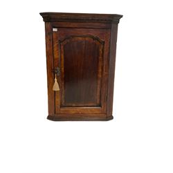 Georgian oak corner cupboard with one door opening to reveal two fixed shelves H107cm