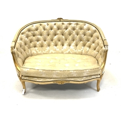 Louis XV style cream and gilt painted two seat sofa with squab cushion, upholstered in buttoned cream damask, 
