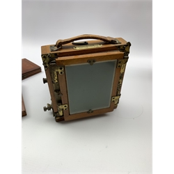 19th/ early 20th century mahogany and brass-bound 'The 1900 Patent Instantograph' quarter plate camera by J. Lancaster & Son, Birmingham, with a Benetfink & Co. lens and two additional plates