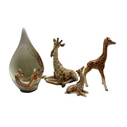 Franz porcelain tealight holder in the form of a Giraffe and calf H22cm and three porcelain Giraffes, two by Franz and the other Beswick (4)