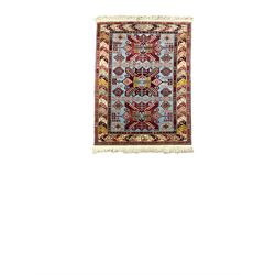 One brown ground rug, with four gul motifs with geometric border, together with two smaller rugs
