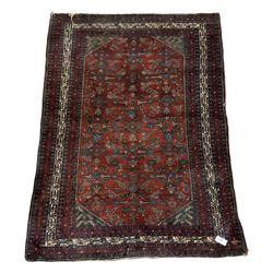 Turkoman rug, the red field with all over floral design, surrounded by multiple borders 