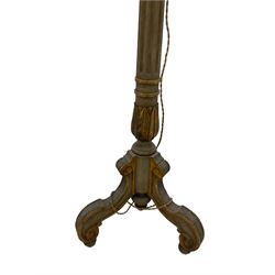 Early 20th century Italian design giltwood standard lamp, fitted with four bulb fittings, the column turned and fluted with carved tulip decoration, the tripod base with scroll cabriole supports terminating in bun feet