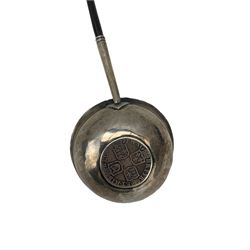 19th century toddy ladle, the circular bowl set with a Queen Anne coin and on a twisted handle