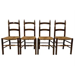 Set four late 19th century country elm dining chairs, ladder backs with turned supports and rush seats 
