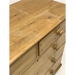 Victorian style pine chest fitted with two short and three long graduated drawers, raised on turned supports 
