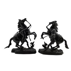 After Guillaume Coustou (1677-1746): Pair of 19th century bronzes of Marly Horses each with a groom, H28cm