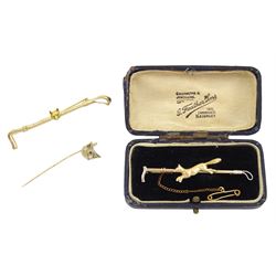 Gold fox head stick pin, silver and 9ct gold fox and crop brooch, stamped and a base metal fox head brooch