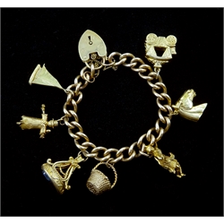 9ct gold curb chain bracelet, with heart locket and seven 9ct gold charms including sailing boat, dancer, rabbit in a basket, intaglio seal fob, scarecrow, horses head and carriage, all hallmarked one tested, approx 57.7gm