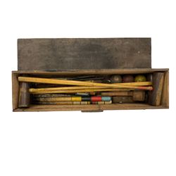 Vintage croquet set, comprising three mallets, lawn markers, balls, hoops, all housed in a stained pine box 