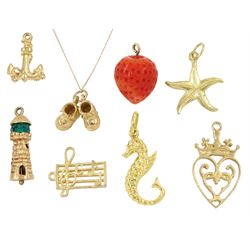 Eight 9ct gold pendant / charms including Luckenbooth, starfish, pair of baby boots, seahorse, music staff, anchor, coral strawberry and lighthouse