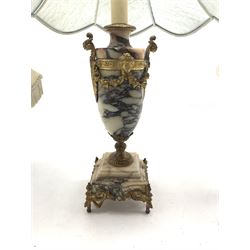 Continental Empire style marble and gilt metal table lamp, of urn form with twin scroll handles, central female mask issuing floral swags, converted to electric, H43cm, together with two lamps (3)