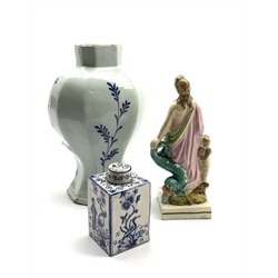  19th Century Faience ware tea caddy painted with Chinese style figures etc. H11cm, Delft blue and white vase H24cm and a Staffordshire figure  