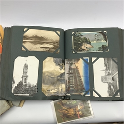 Postcard album containing Edwardian and later examples, many being used with stamps and various cigarette and other trade cards in albums, many being John Players & Sons etc