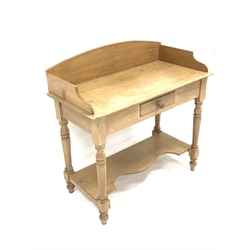 Victorian pine wash stand, with three quarter galleried top over single drawer, raised on turned supports united by under tier, W94cm