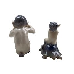 Two Royal Copenhagen figures 'Crying Faun' no. 1061 designed by Knud Kyhn H11cm and 'Faun on Tortoise' no. 858 designed by Christian Thomsen (2)