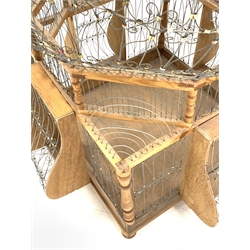 Very large decorative wire work bird cage, of bulbous form on wooden base, H154cm