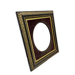 Mirror with brass frame