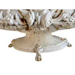 Corneau Alfred á Charleville - mid-19th century French cast iron planter, swollen and waisted oval form with scalloped upper rim, scrolled and ivy leaf cast handles, the front mounted by extending floral casting, on oval footed base with foliage and paw cast feet, the interior with drainage holes, inscribed 'Corneau Alfred á Charleville No 3' 