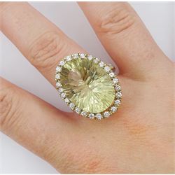 18ct gold oval cut lemon quartz and round brilliant cut diamond cluster ring, with diamond set shoulders, quartz approx 16.15 carat, total diamond weight approx 0.90 carat
