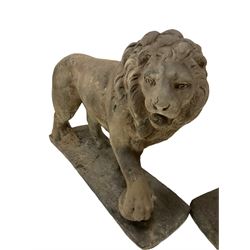 Pair of reconstituted stone garden lions, on square base L75cm