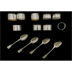 Collection of nine various silver serviette rings and four early 19th century silver fiddle pattern tea spoons 7.5oz