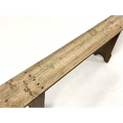 19th century rustic elm narrow bench, with three shaped panel supports, L235cm, H47cm, D21cm