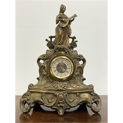 19th century French brass figural mantel clock, with integral key and later movement, W35cm