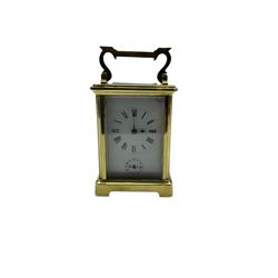 French - 19th century 8-day brass cased carriage clock,  going barrel movment with an alarm sounding on a bell, in a corniche case with an enamel dial, Roman numerals and alarm setting dial, cylinder platform escapement. With key.
