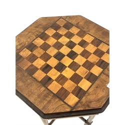 Victorian walnut games table, the octagonal top inlaid with rosewood and boxwood games board lifting to reveal storage area, raised on stained beach turned and block supports, W45cm