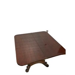 Late 19th century mahogany tea table, the fold over top raised on octagonal vasiform pedestal, terminating in quardripod base with paw feet