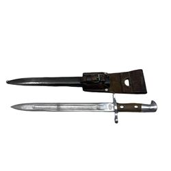 Swiss bayonet marked to the ricasso 'Waffenfabrik Neuhausen' blade length 30cm in steel scabbard with leather frog inscribed 'J Tanner, St. Margrethen, 1947