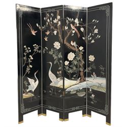 Ebonised Chinese four panel screen, with carved birds and foliate 