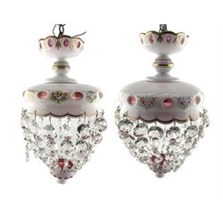 Pair of Bohemian cranberry glass ceiling lights, overlaid and painted with small sprays of flowers and hung with lustre drops D19cm x H19cm excluding drops