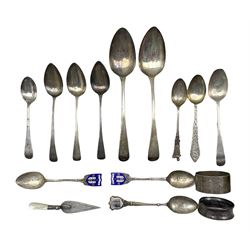 Pair of George III silver dessert spoons London 1814 Maker Peter and William Bateman, ten various silver teaspoons and souvenir spoons, two serviette rings and a trowel shape book mark 