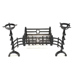 Wrought iron fire basket with integral andirons, 