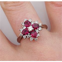 White gold oval ruby and round brilliant cut diamond cluster ring, stamped 18ct