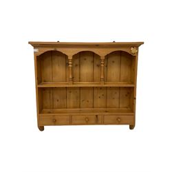 Pine wall plate rack, the projecting cornice and one plate shelf over three short drawers 