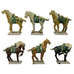 Group of six Chinese Tang style pottery horses, 17cm high and smaller