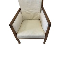 Edwardian mahogany framed armchair, satinwood stringing, upholstered in ivory foliate patterned damask fabric, on tapered supports with spade feet