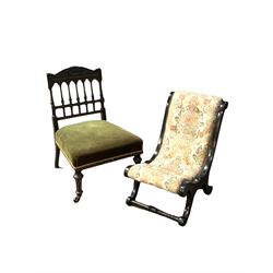 Victorian ebonised and parcel gilt side chair, spindle back over seat upholstered in green velvet, raised on turned supports () together with an ebonised nursing chair 