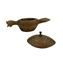 Scandinavian chip carved ornaments to include a bird form bowl and cover, drinking vessels, shoes, bowls etc, together with a vintage wooden shoe stretcher and a pair of carved treen birds 