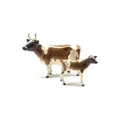 Beswick model of an Ayrshire cow No. 1350 and an Ayrshire calf No. 1249B