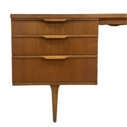 Austinsuite - mid-20th century teak dressing table, raised mirror back, fitted with seven graduating drawers, on cylindrical tapering supports