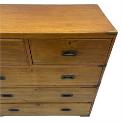 Early 19th century teak campaign chest, fitted with two short and two long drawers, with brass corner brackets and sunken brass handles