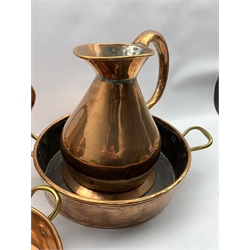 Copper one gallon measure, two copper jugs and two 2 handled pans